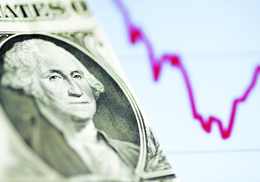 الدولار يتراجع بعد كلام باول عن خفض الفائدة