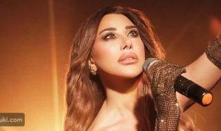 نجوى كرم بصيحات جمالية غاية في الأنوثة في كليبها الجديد